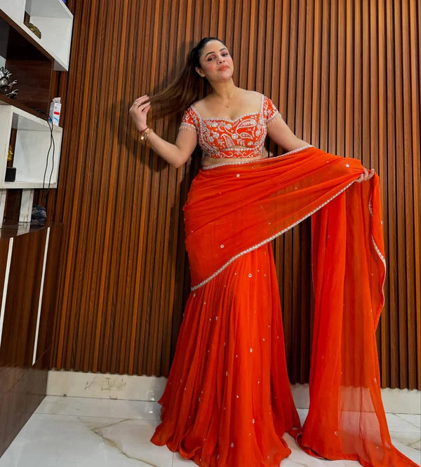 Presenting Orange Embroidered Lehenga Saree