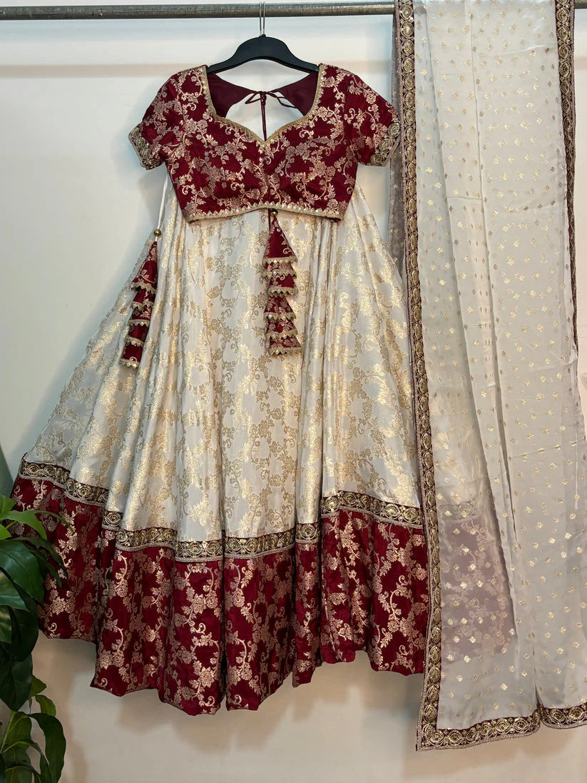 Presenting Festival Special White and maroon Lehenga set